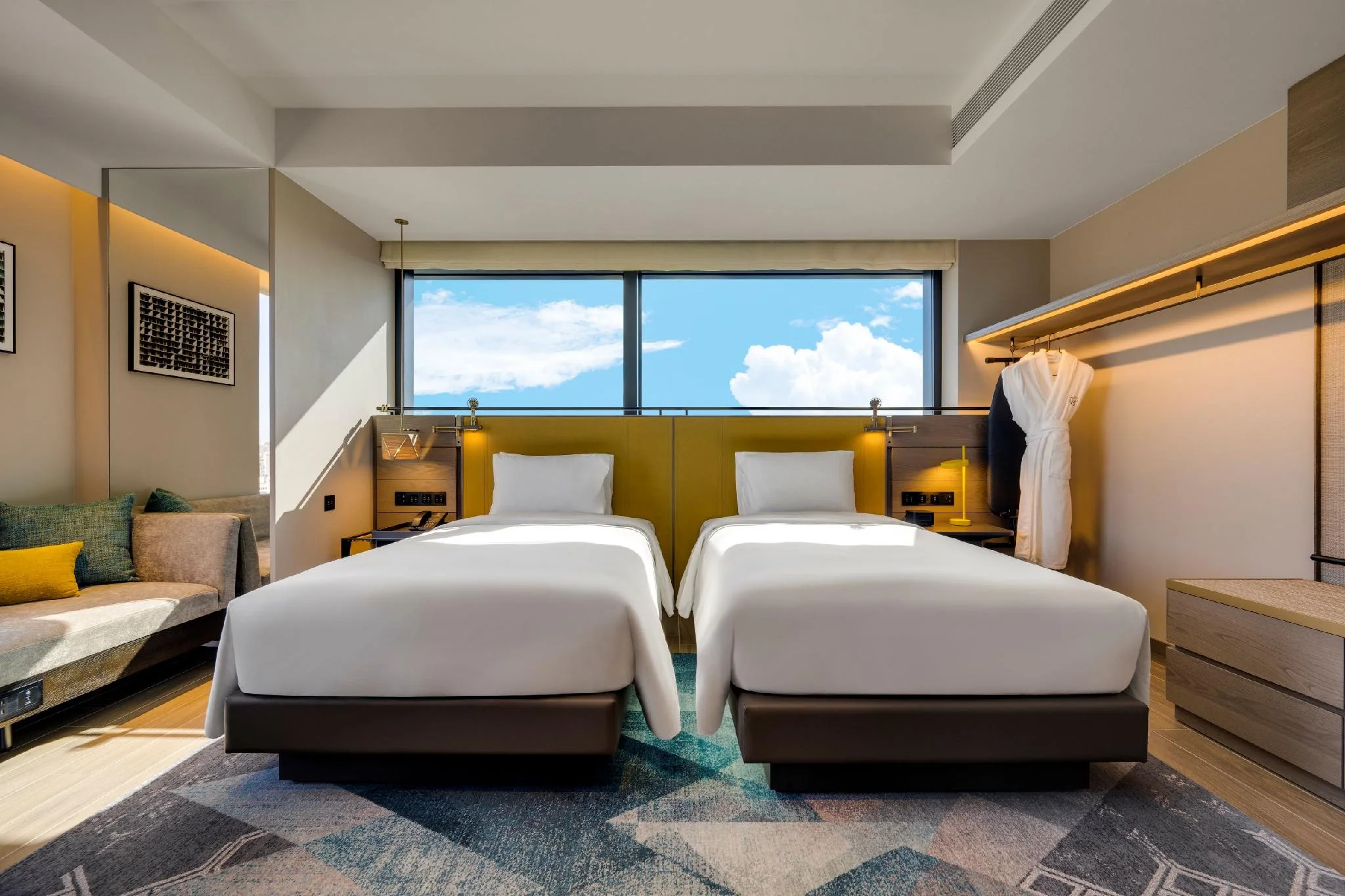 TWIN CORNER ROOM WITH 2 SINGLE BEDS